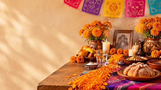 A bright Día de Muertos ofrenda with cempasúchil, papel picado, candles, pan de muerto, and family memories